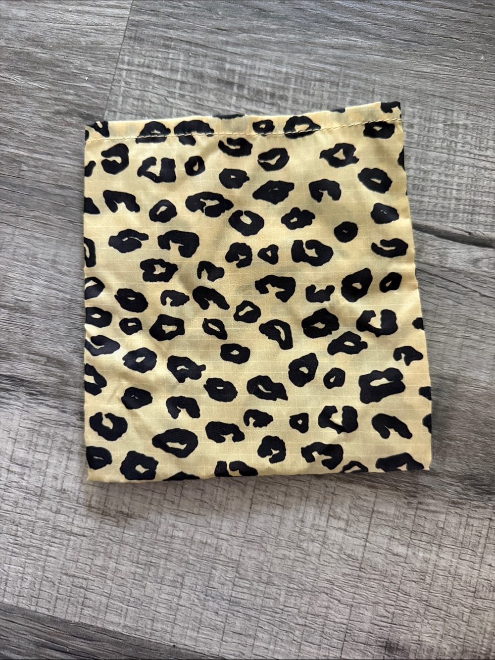 BAGGU Leopard Print Foldable Pouch in Yellow and Black - Picture 2 of 2